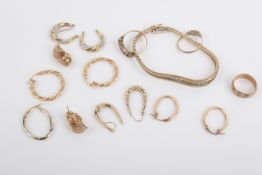 A small group of assorted 9ct gold earrings and rings.