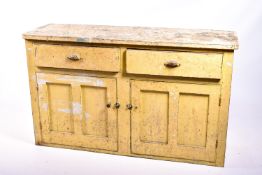 A vintage pine sideboard.