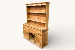 A Victorian pine kitchen dresser.