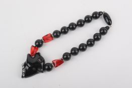 A vintage ZE. Co., Milan, Italy chunky lucite fashion black panther necklace.