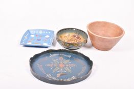 Four wooden bowls and a tray.