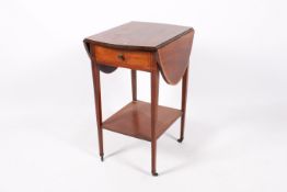 An Edwardian mahogany pembroke table.