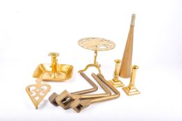 A collection of assorted brassware.