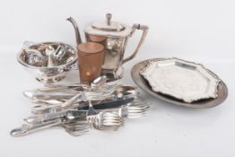A collection of silverplated table items.