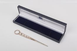 A silver Harrison Brothers & Howson Ltd letter opener.