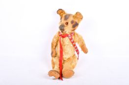 Early 20th century jointed plush teddy bear.