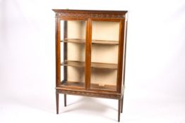 An Edwardian mahogany display cabinet.