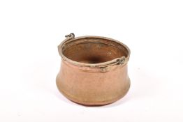 A large copper cooking pan. With a single handle, Diameter 33cm x H22cm.