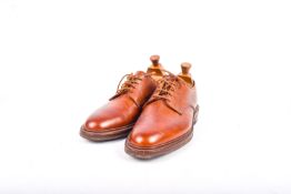 A pair of gentleman's Crockett & Jones Grasmere brown leather shoes. UK size 9, with lasts.