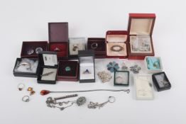 A large assortment of silver and white metal jewellery. Including a Masonic style brooch, 5.