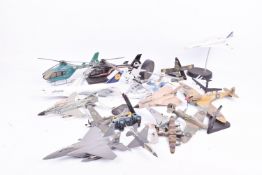 A collection of diecast aircraft and constructed aviation models.