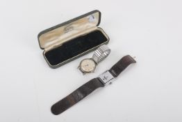 A Swiss Art Deco nickel plated jump hour mechanical digital wrist watch and a Girand-Perregaux