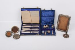 An assortment of Victorian and later silver and white metal.