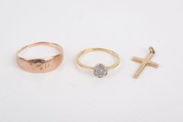 Three pieces of 9ct and 18ct gold jewellery.