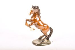 A Beswick Pottery model of a Rearing Stallion, number 1014.