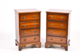 A pair of 20th century Regency style mahogany chest of four drawers. Raised on bracket feet.