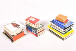 A collection of assorted books on the subject of military uniforms and firearms