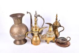 Collection of Islamic and Persian metalware. Including ewers and vases, etc.