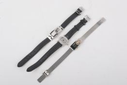 Three ladies' fashion wristwatches.