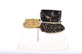 Three womens' vintage evening clutch purses. Including an embroidered and a beaded example, etc.