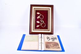 A collection of vintage Algers postcards and a pair of white metal earrings.