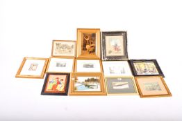 A collection of assorted framed prints and pictures.