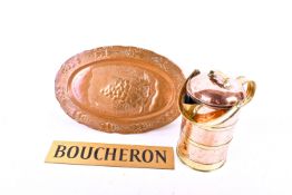 A group of three metalware items.