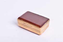 A 20th century gilt metal and agate snuff box.