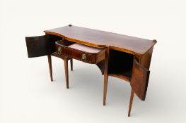 A Georgian revival mahogany breakfront sideboard.