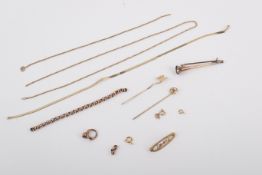 A small group of gold and yellow metal jewellery.