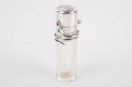 A Victorian glass and silver topped cylindrical perfume bottle.