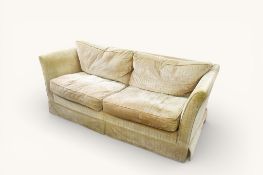 A contemporary low back two seater sofa. Having textured upholstery with feather filled cushions.