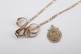 A collection of gold and yellow metal jewellery.