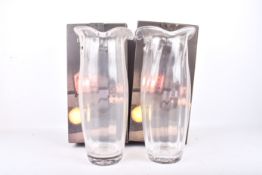 A pair of modern Dartington Crystal Lily vases, boxed as new.
