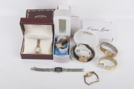 A group of assorted costume watches.