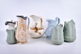 Seven assorted pottery pitchers, mostly 19th century English.