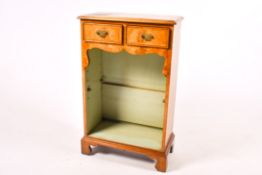 A 20th century Georgian style mahogany side cabinet with two drawers.