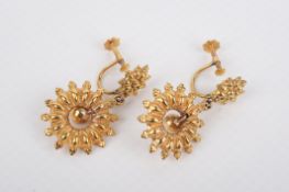 A pair of 9ct gold drop earrings.