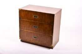 A late 20th century campaign style chest of drawers.