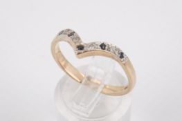 A hallmarked 9ct gold wishbone ring.