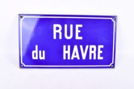 A French blue enamel road sign 'Rue Du Havre'.