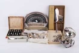 A quantity of assorted silverplated table items.