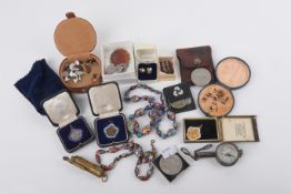 An assortment of costume jewellery and collectables.