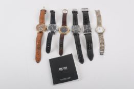 A collection of wristwatches.