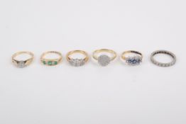 Six 18ct gold and white metal gem set dress rings.