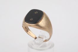 A 9ct gold signet ring. Set with an agate stone, (band AF) 4.25g gross.