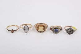 Five gold and other dress rings.