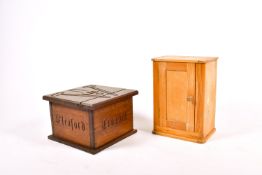 A croquet box and a pine cupboard.