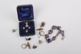 A small group of gold and silver jewellery.
