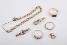 A small group of gold jewellery. Including a bracelet with each link marked 18ct, this weighing 10.